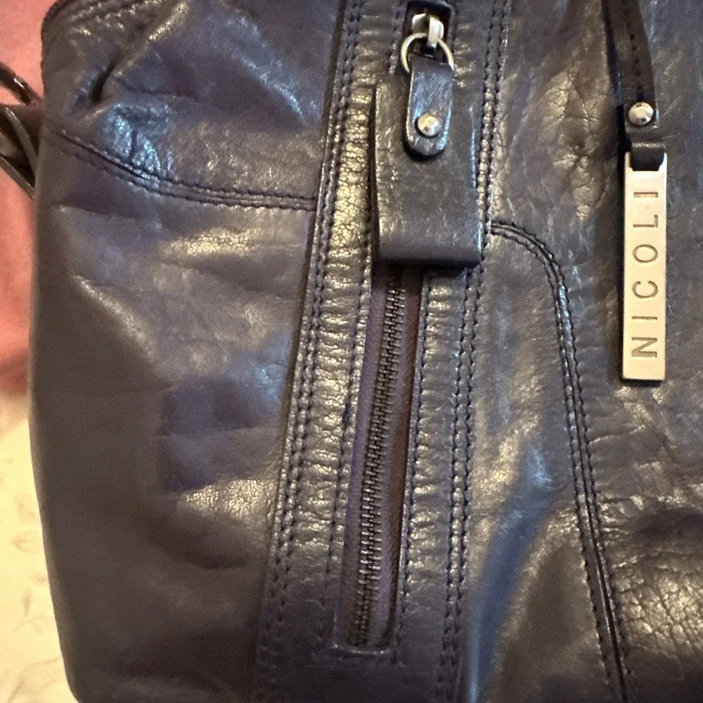 Nicoli Italian leather Large satchel features a dark purplish Blue finish